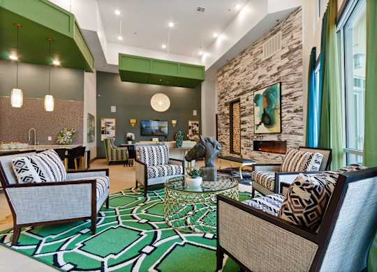 a living room with couches and chairs and a fireplace