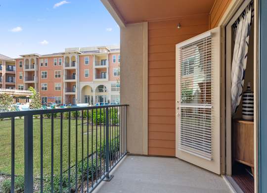the outlook of a balcony at the preserve at polk apartments