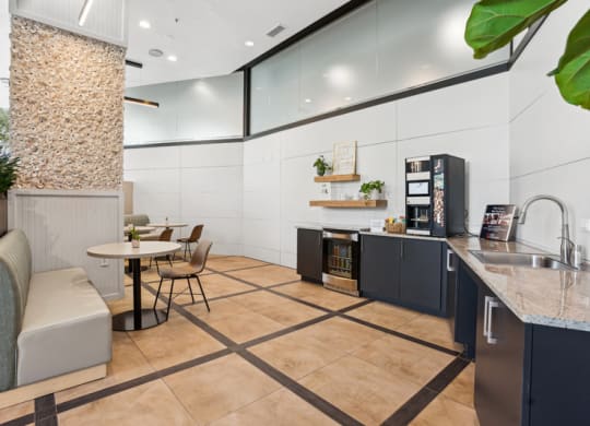 a kitchen and dining area in a hotel room
