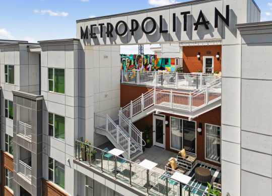 a rendering of the metropolish sign on the side of a building