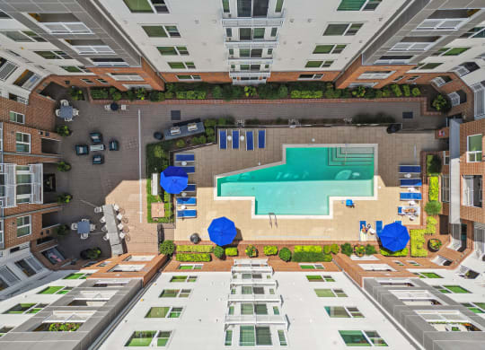 an overhead view of a swimming pool in the middle of a building