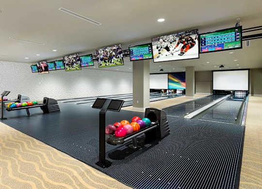 Private bowling lanes with scoring screens at Elements Apartments, Irvine, California