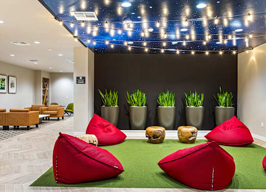 Lounge area with bean bags and starlight ceiling at Elements Apartments, Irvine, 92612