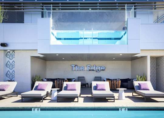 Poolside lounge area with second story pool deck at LUX by Garden* Apartments, San Diego, 92122