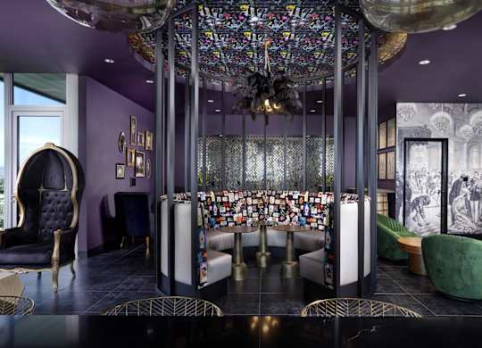 Circular lounge with decorative ceiling and glass enclosure at LUX by Garden* Apartments, San Diego, California