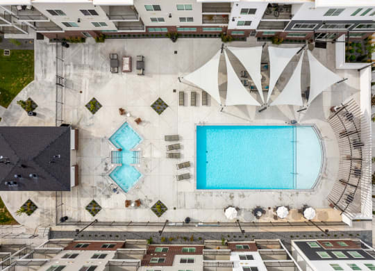 arial view of a swimming pool in the middle of a building