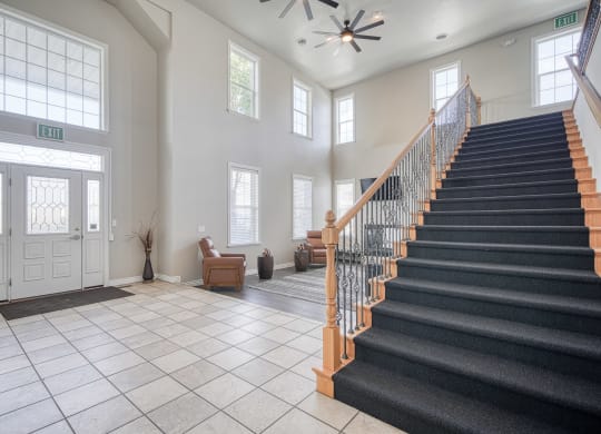 a view of the entryway and stairs to the second floor