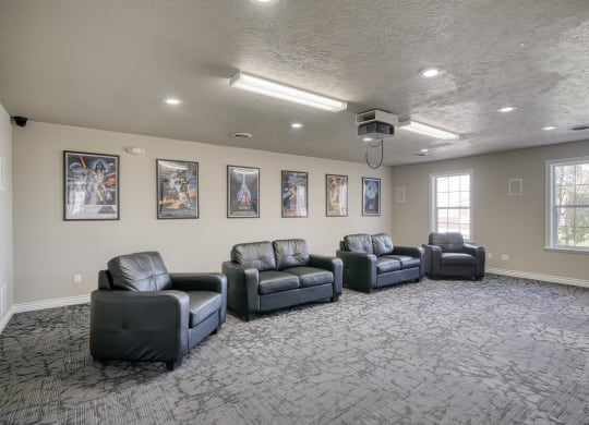 a large room with couches and chairs