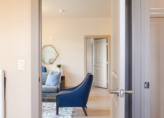 a view of the living room from the dining room at Sugar House Apartments By Urbana, Salt Lake City, UT, 84105