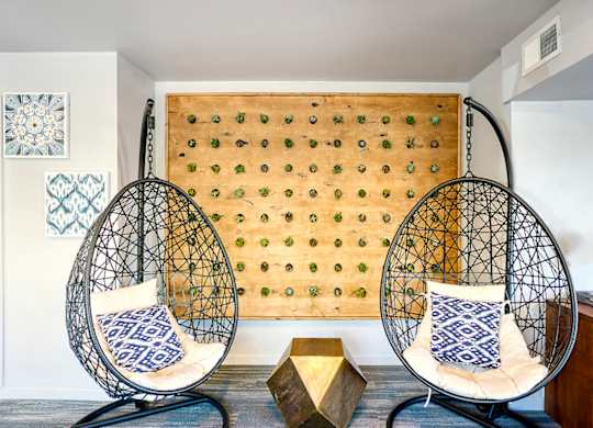 Metal Hanging Egg Chairs at Agave Apartments, Tempe, 85281