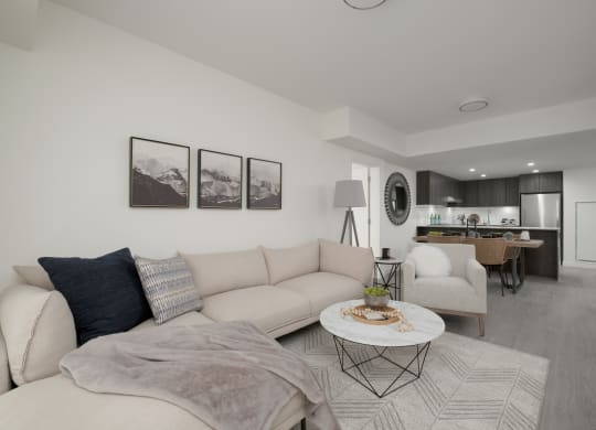 a living room with couches and a coffee table