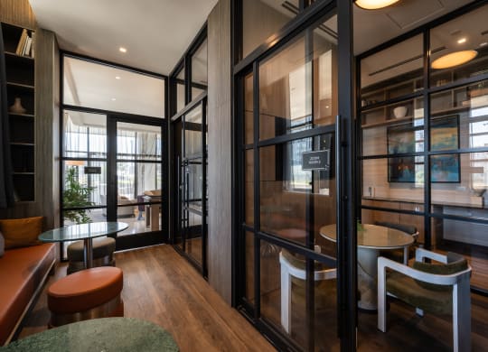 a room filled with furniture and a large window