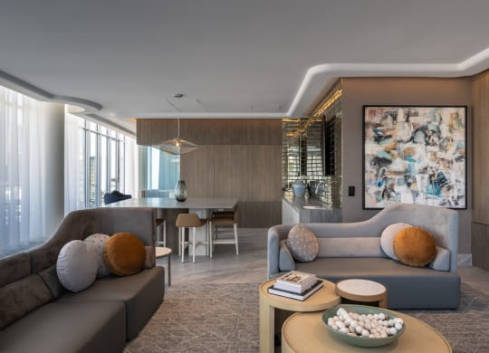 a rendering of a living room with couches and a table