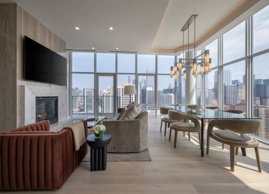 a living room filled with furniture and a large window