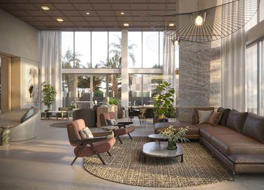 A modern living room with brown leather sofas and a large window.