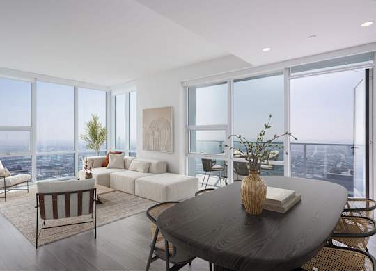 A modern living room with a view of the city.