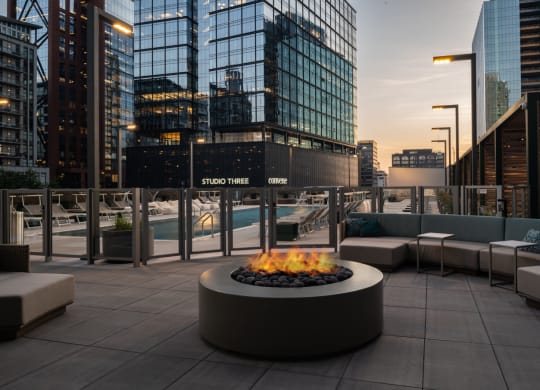 a fire pit on the roof of a building