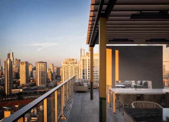 a balcony with a view of the city
