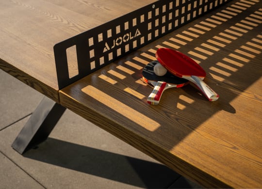a pile of keys on a park bench
