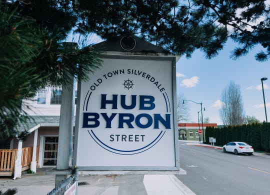 a sign in front of a building with the words hud byron street on it at Rivulet, Silverdale, WA