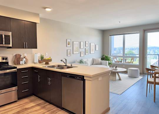 a kitchen and living room in an apartment at Spyglass Hill Apartments, Bremerton, Washington