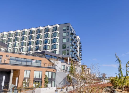 Front view of stunning apartment building with large windows at Marina Square, Bremerton