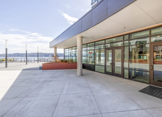 a view of a building with glass windows and doors at Marina Square, Bremerton, 98337