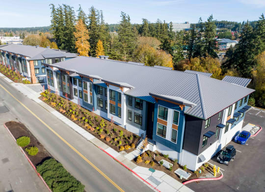 arial view of the roof of a building with trees at Rivulet, Silverdale, WA