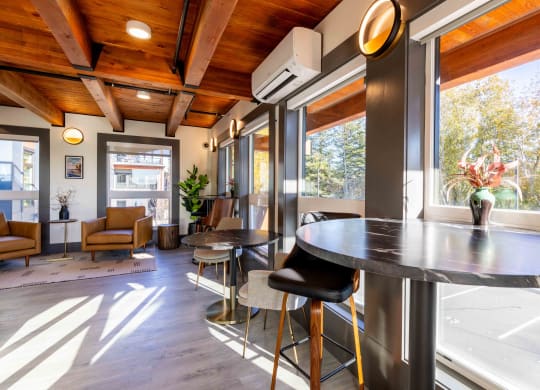 a kitchen with a counter and a large window at Rivulet, Silverdale, WA
