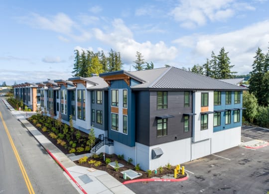 an aerial view of a row of houses in a parking lot at Rivulet, Silverdale