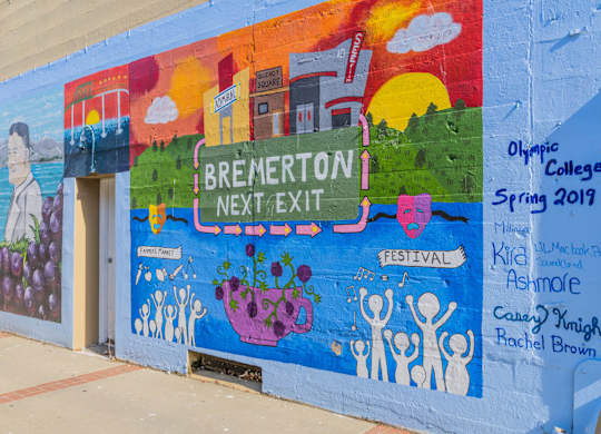 A mural on a wall with the words