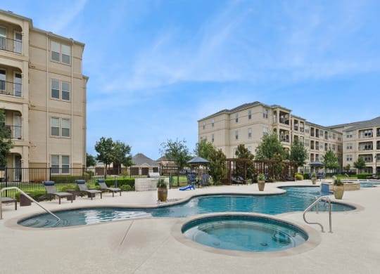resort-inspired swimming pool and spa at Retreat at Wylie 55+ senior apartments