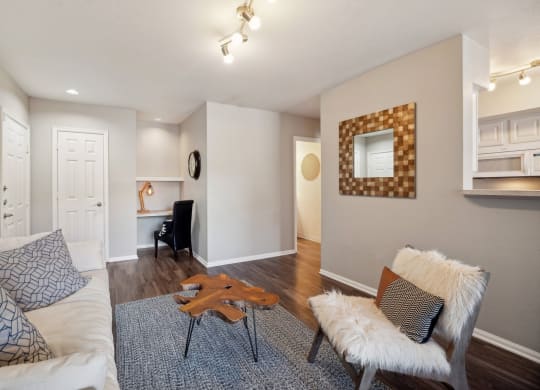living room with hardwood-inspired flooring at Dakotal Ridge luxury apartments