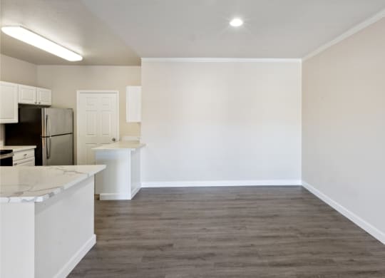 dining area with wood-inspired flooring at Bridgeport Ranch apartments