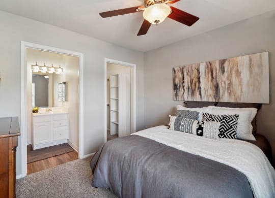 luxury bedroom with a ceiling fan at Dakota Ridge luxury Littleton, CO apartments