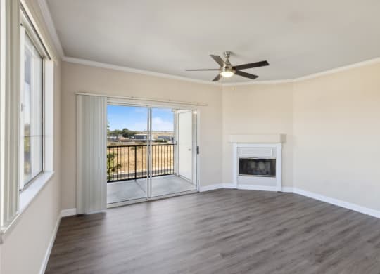 living room with a fireplace at Bridgeport Ranch apartments