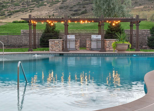 poolside grilling area at Dakota Ridge apartments