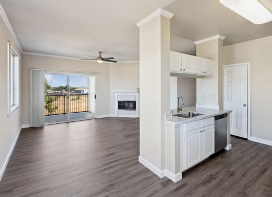 spacious, open-concept kitchen and living area at Bridgeport Ranch apartments