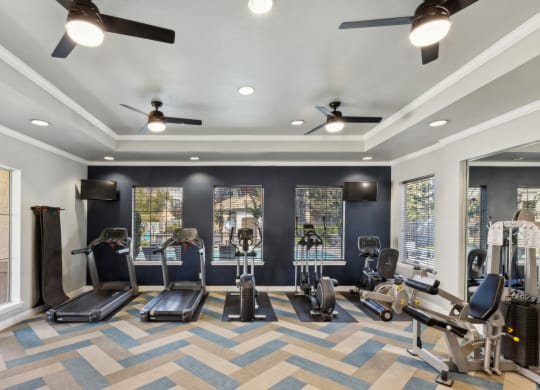 fitness center with cardio equipment at Bridgeport Ranch apartments