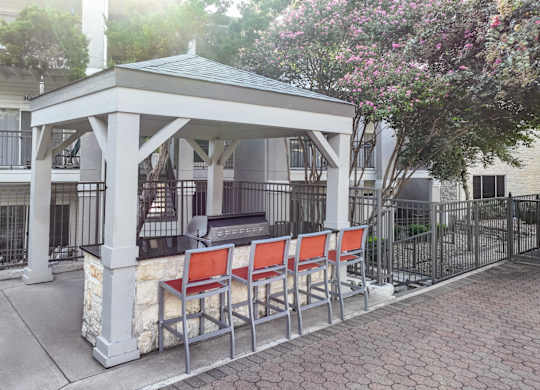 outdoor gazebo with grills and bar style seating at San Marin apartments