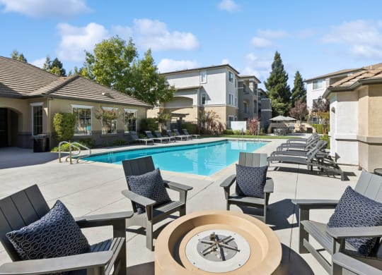swimming pool and fireside lounging area at Bridgeport Ranch apartments