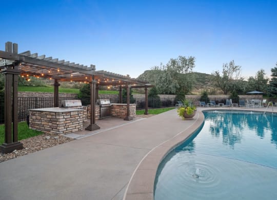 poolside grilling area at Dakota Ridge apartments