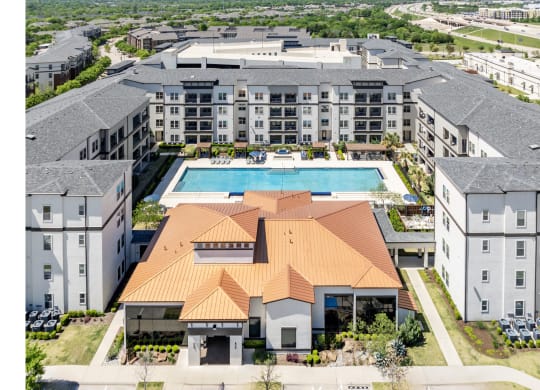 aerial view of Berkshire Spring Creek apartments with a swimming pool