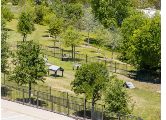 aerial view of the dog park at Berkshire Spring Creek pet friendly apartments in Garland, TX