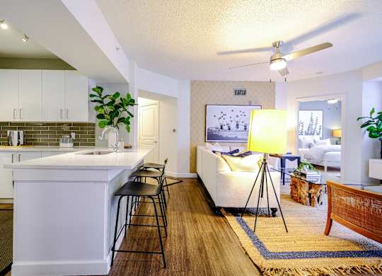 Spacious, open-concept kitchen and living area at Sophia at Abacoa luxury apartments in Jupiter, FL