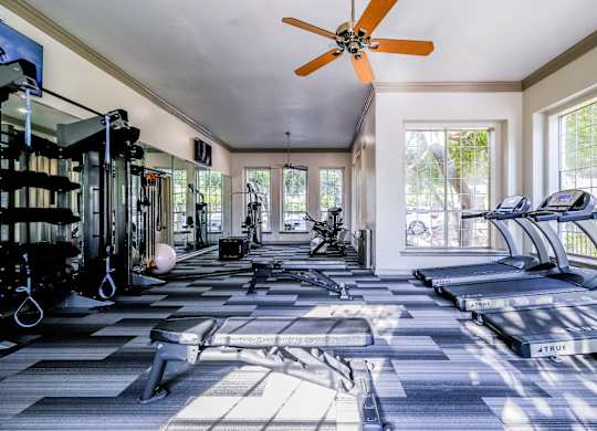 fitness center with cardio machines at San Marin apartments