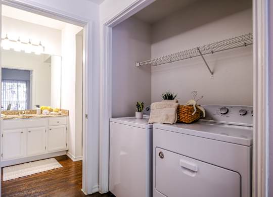 laundry zrea and view of luxury bathroom at San Marin apartments