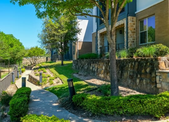 exterior building with lush landscaping at Berkshire Medical District apartments