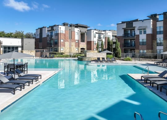 resort-inspired swimming pool at Soho Parkway apartments