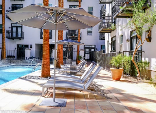 poolside lounging area at Roosevelt Square apartments